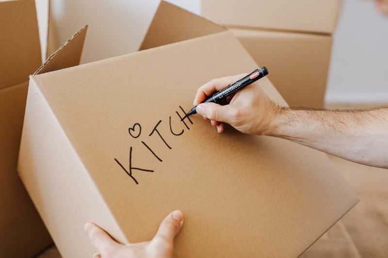 Cardboard boxes being prepared for a household move